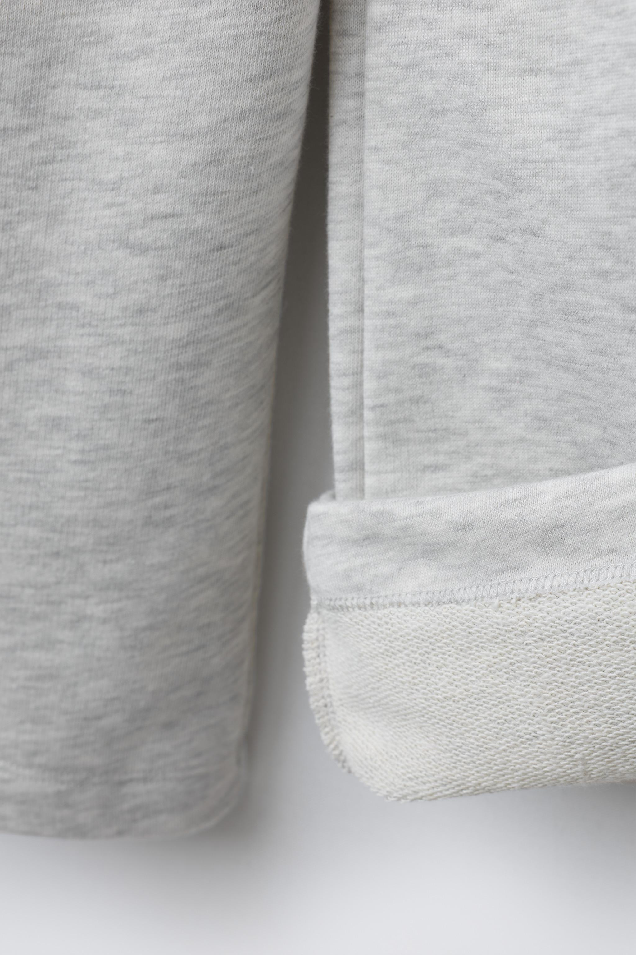 PANTALON EN MOLLETON À JAMBES LARGES ÉTOILES