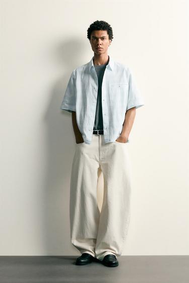 CAMISA DENIM RELAXED FIT DE QUADRES - Blau cel de Zara - Imatge 0