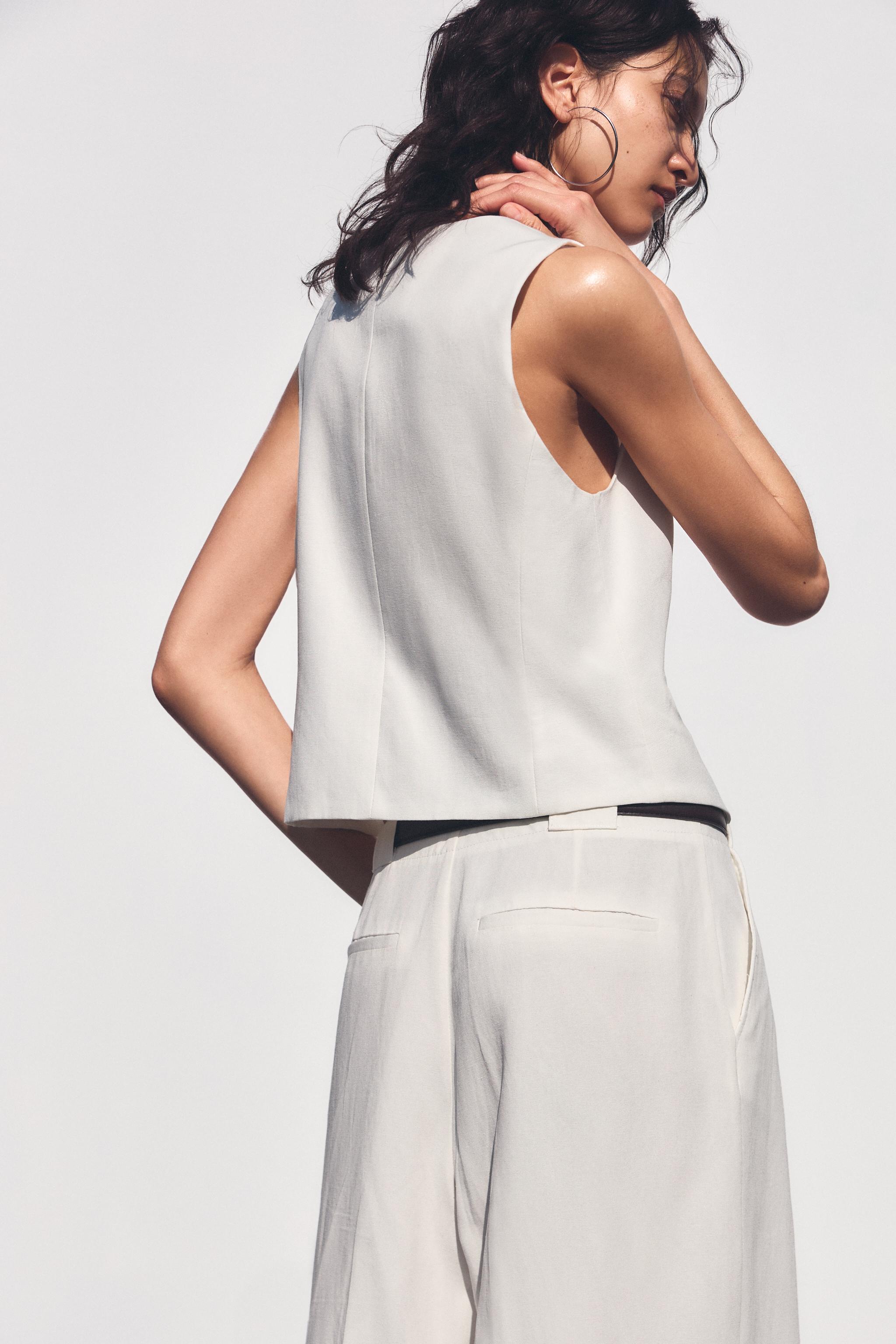 GILET À POCHES LISERÉ