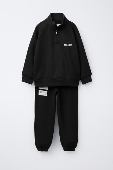 Zara LUKUGA DRESSIPLUSI JA ETIKETTIDEGA JOGGER-PÜKSTE KOMPLEKT - Must