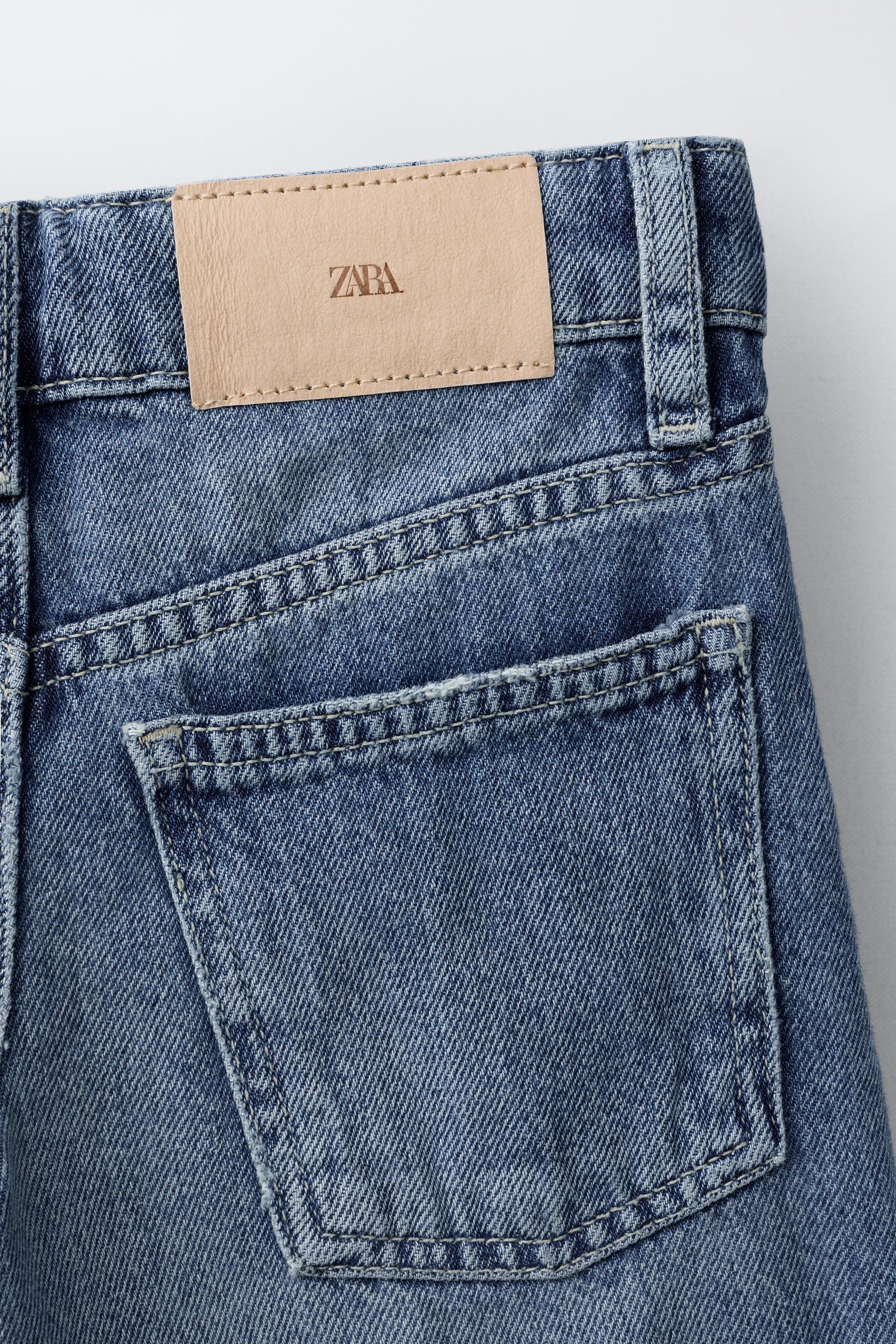 SHORT EN JEAN LONG DÉCHIRURES