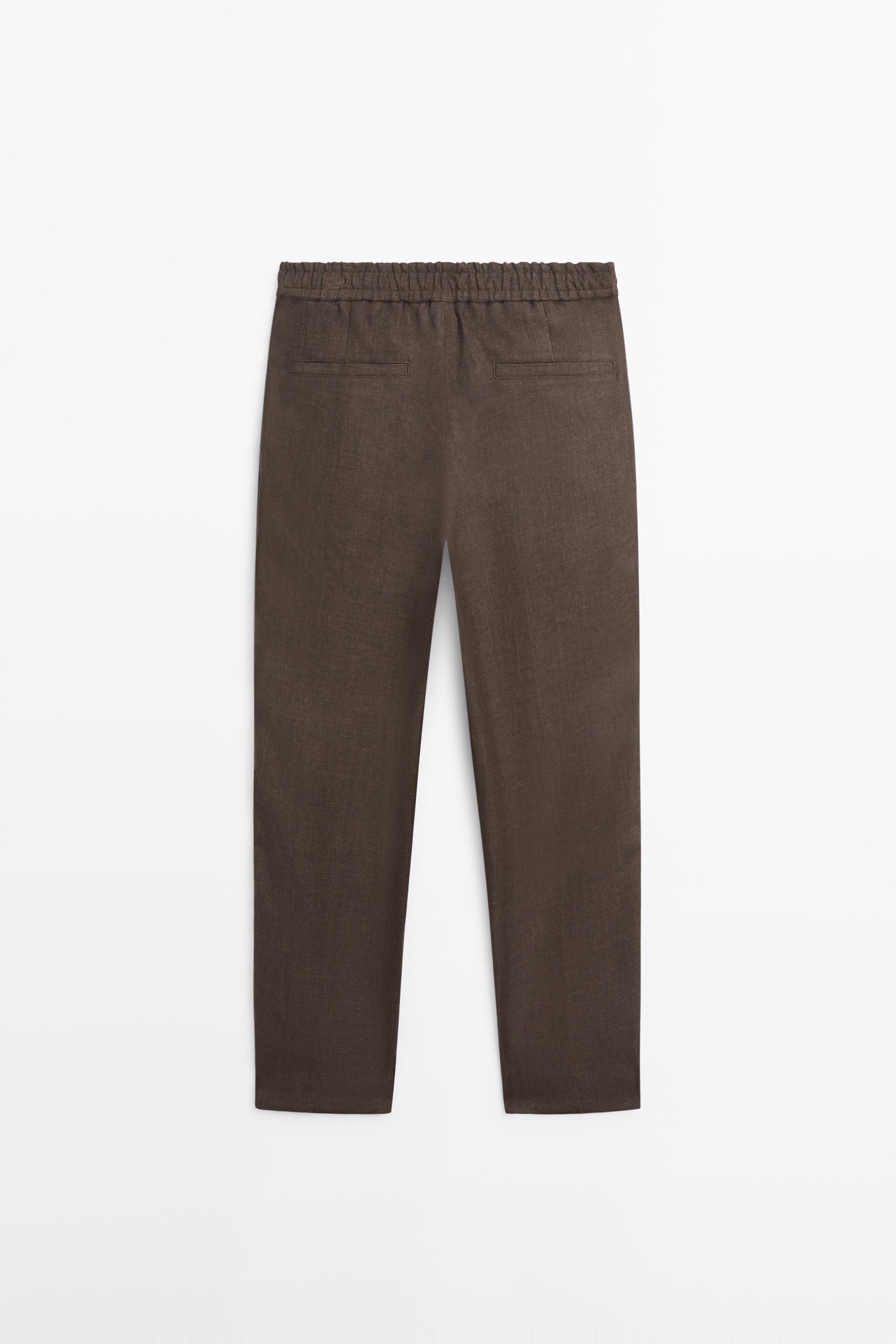Faded total look linen trousers
