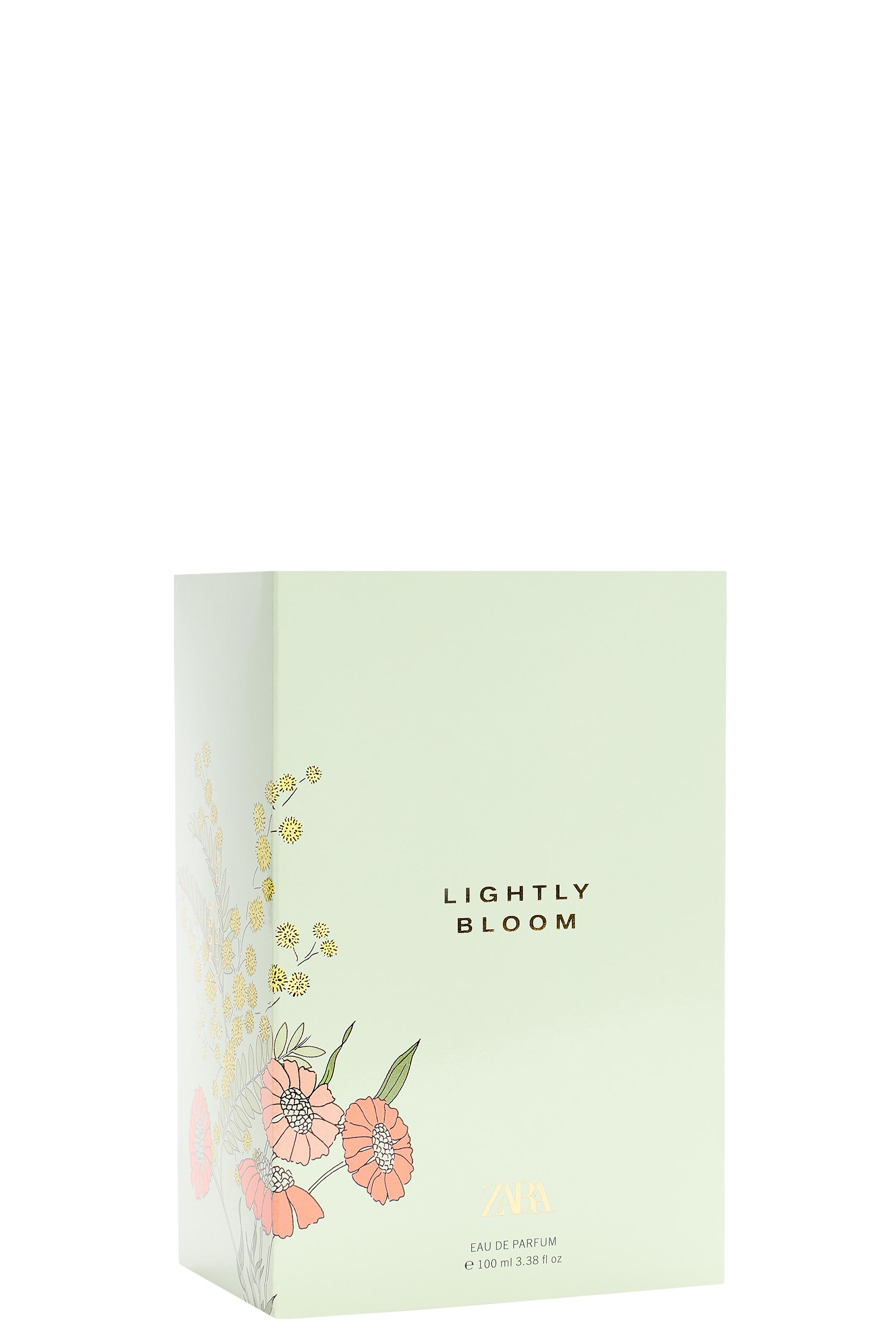LIGHTLY BLOOM EDP 100 ML (3.4 FL. OZ). — TINTED LEATHER