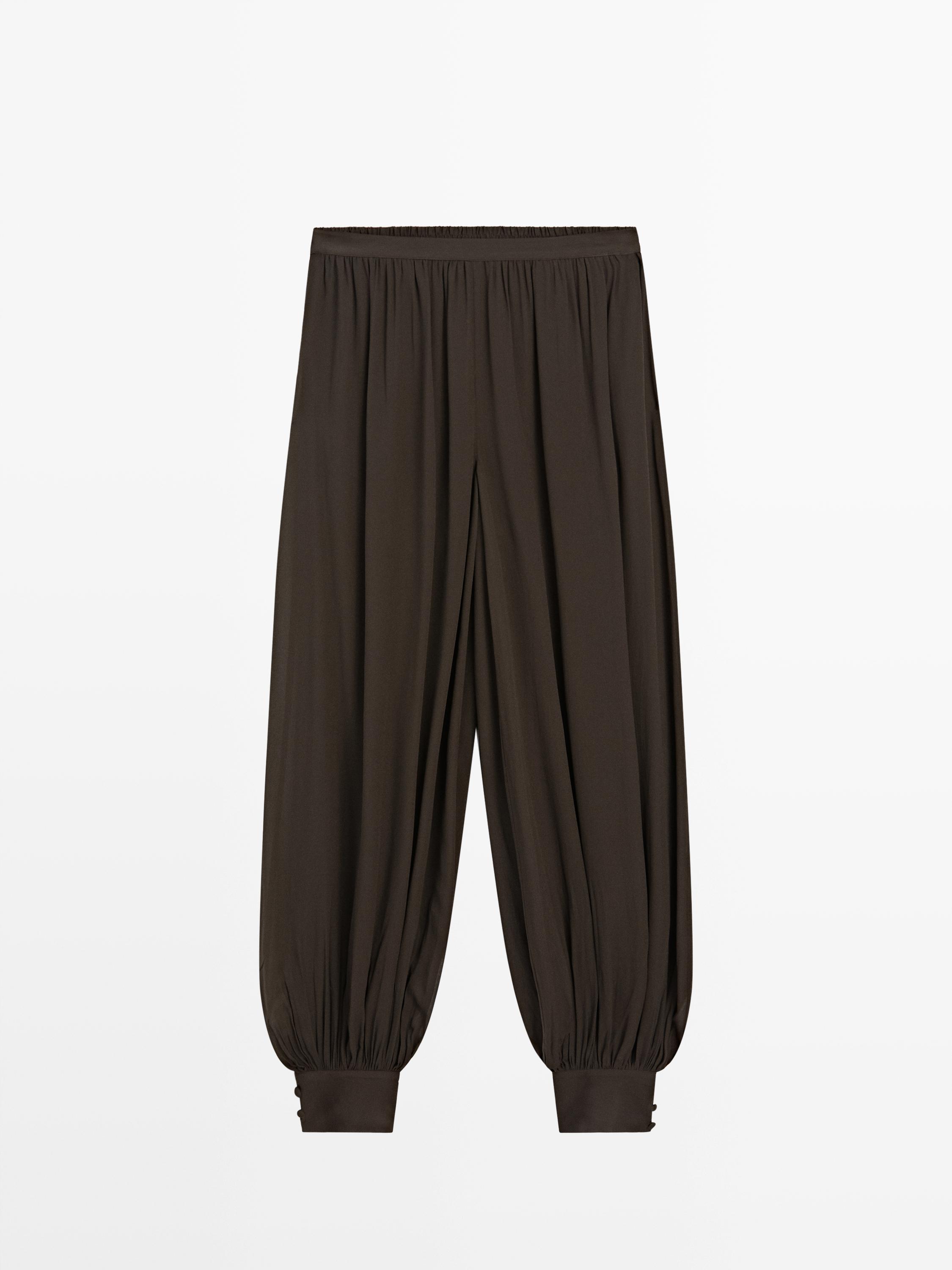 Pantalon bouffant semi-transparent avec boutons