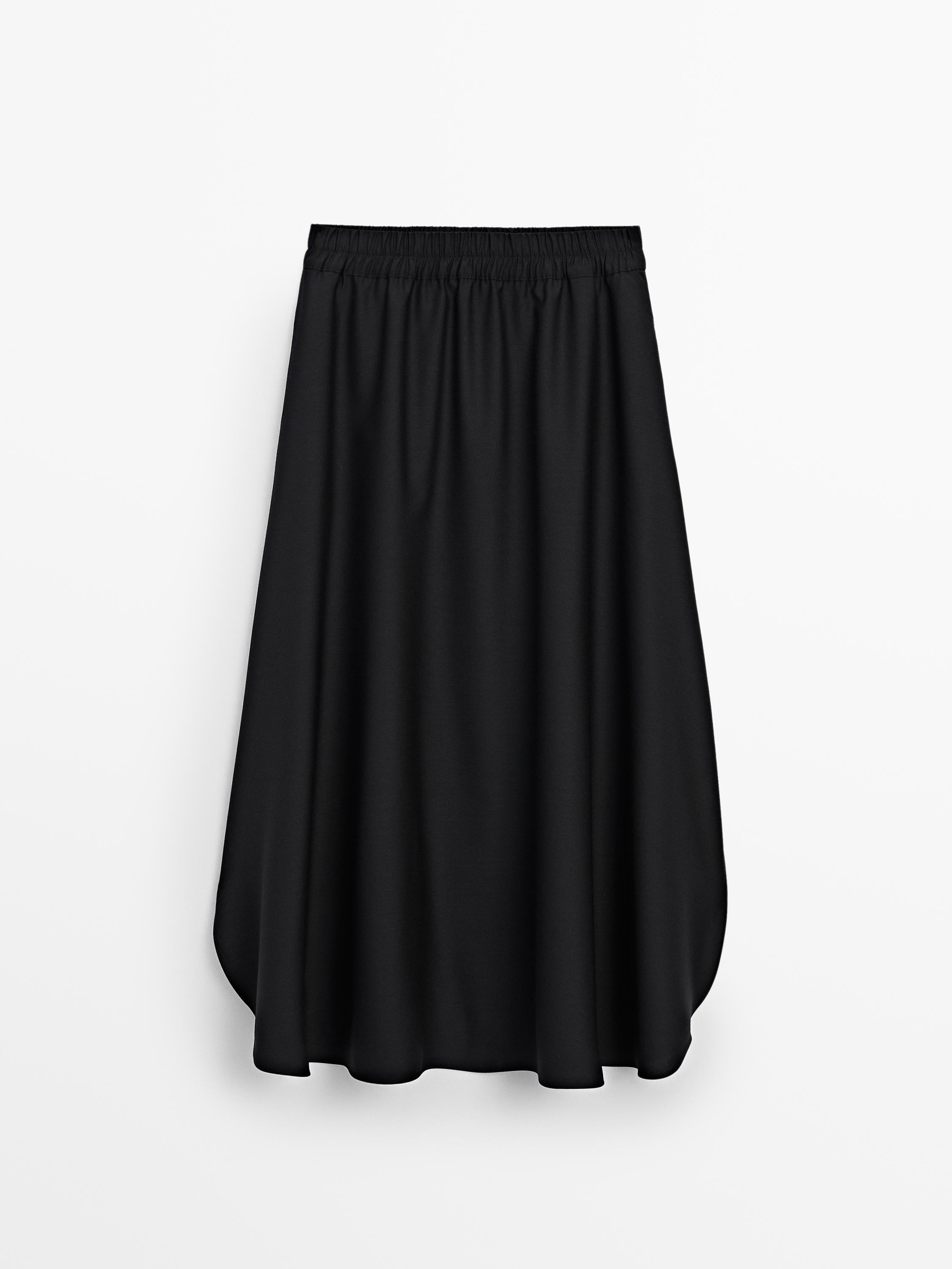 Long skirt with slits and elastic waistband