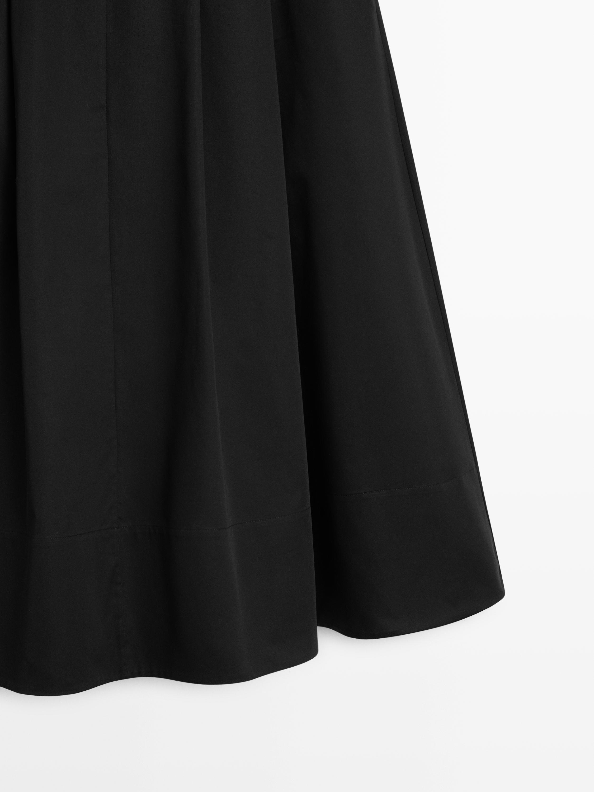 Midi skirt with box pleats
