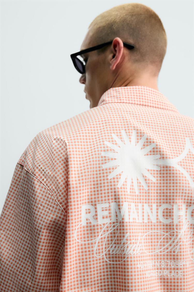Camisa de corte boxy con estampado de eslogan 7