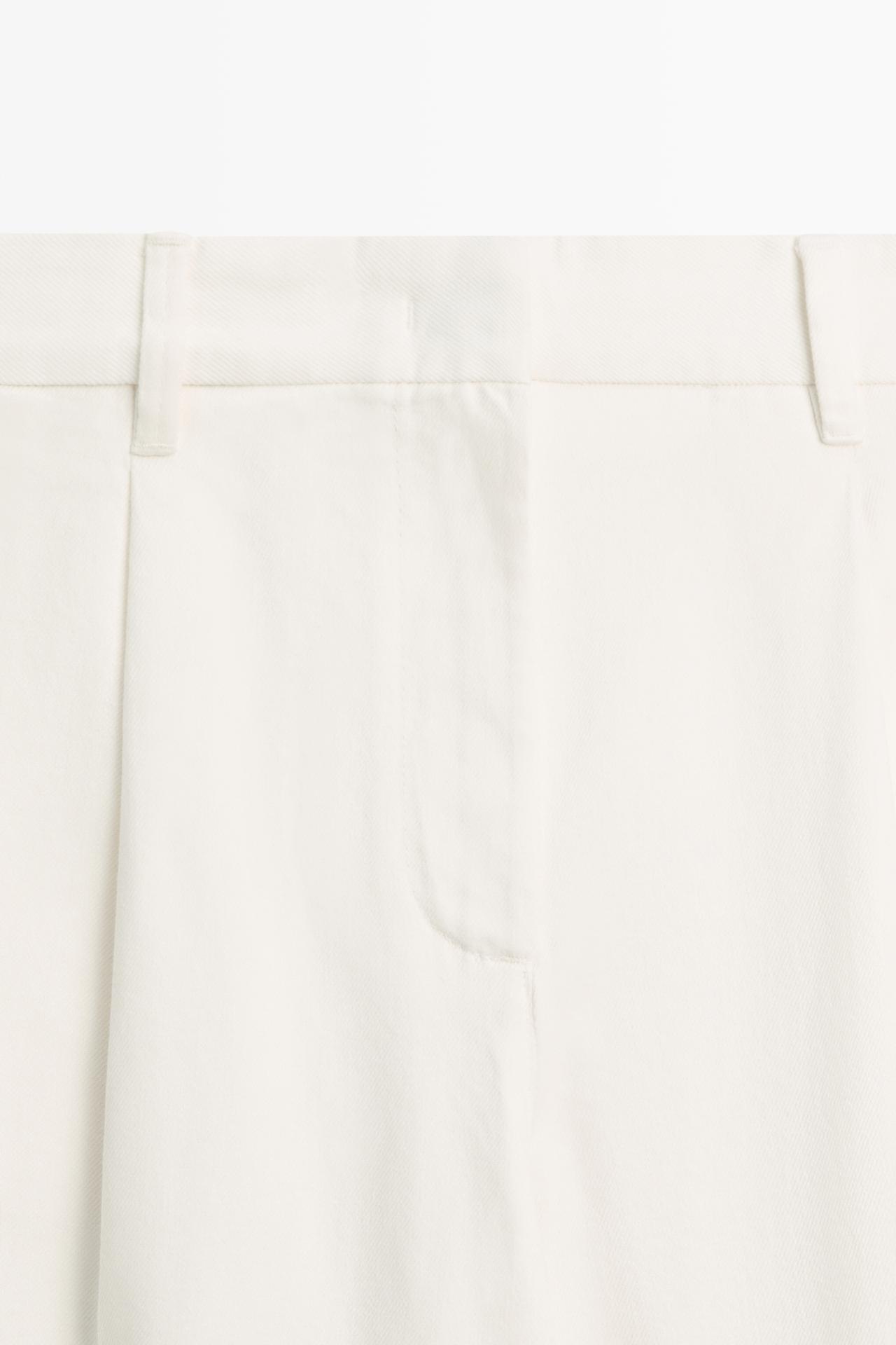 Low-rise pleated wide-leg pants — Oyster-white
