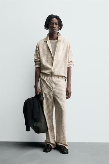 STRIPED WRINKLED-EFFECT FLOWING TROUSERS - Ecru by Zara