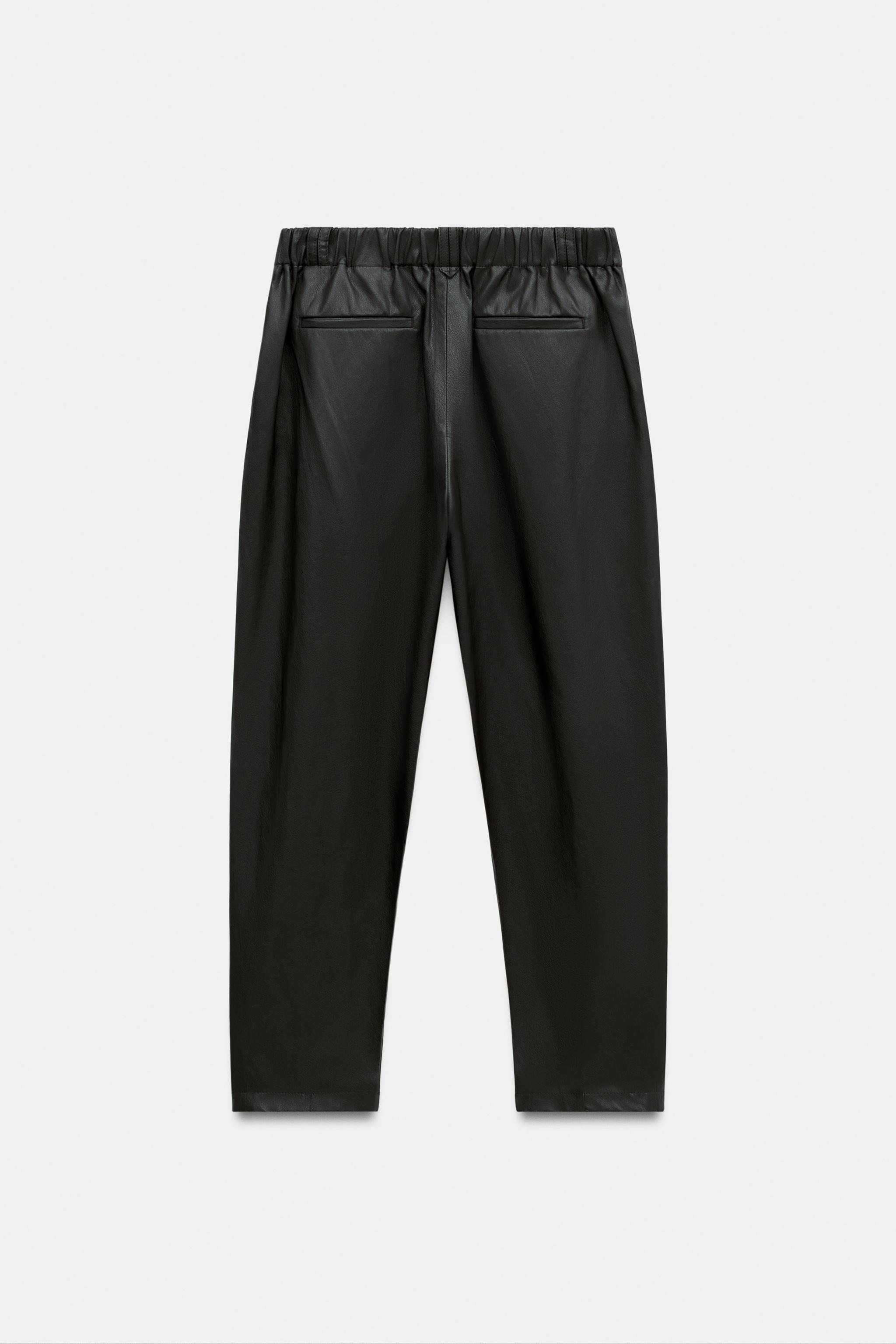 FAUX LEATHER SEAM PANTS