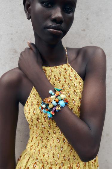 PACK PULSERAS CUENTAS MULTICOLOR - Multicolor de Zara