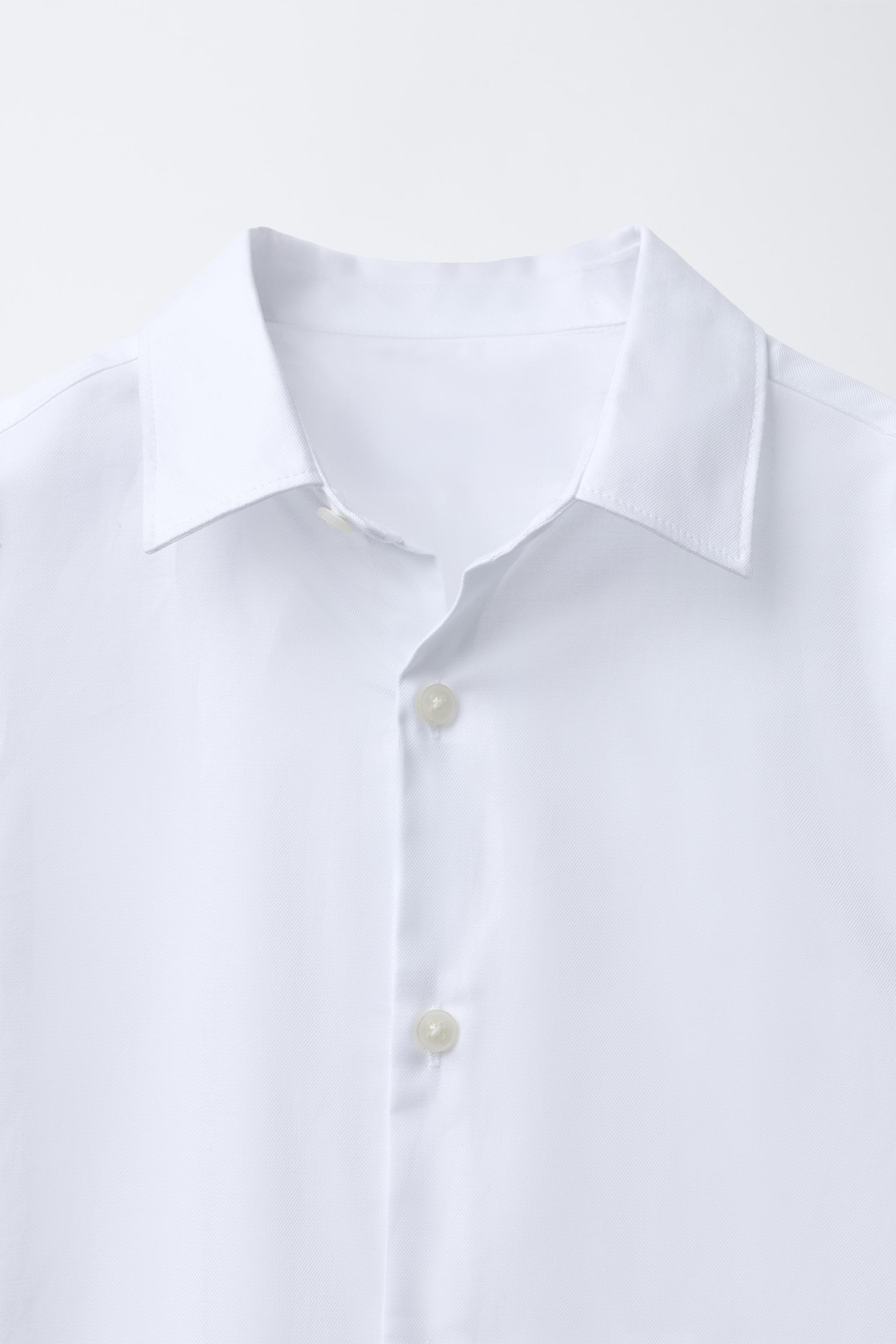 CHEMISE UNIE HABILLÉE