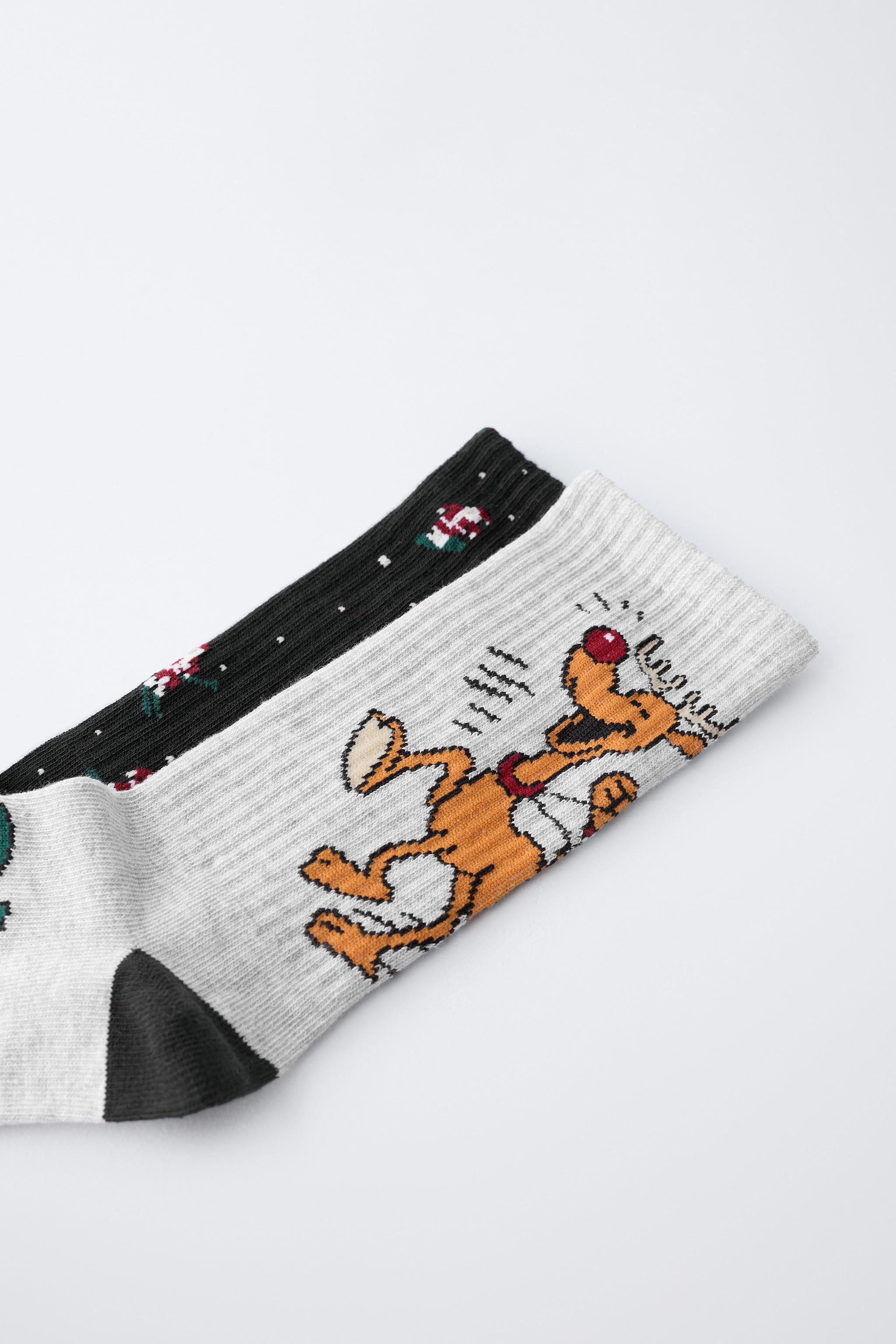 TWO-PACK OF SANTA CLAUS AND REINDEER LONG SOCKS