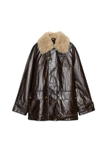 Front view of a brown jacket with a faux fur collar, long sleeves, patch pockets with flaps, and button fastening.