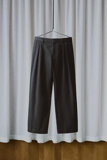 БРЮКИ ЧИНОС СО СКЛАДКАМИ AARON LEVINE X ZARA — ЧЕРНЫЙ от Zara