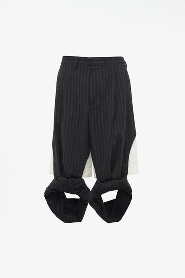 LIMITED EDITION CONTRAST-FABRIC CUTOUT PANTS — Black 1