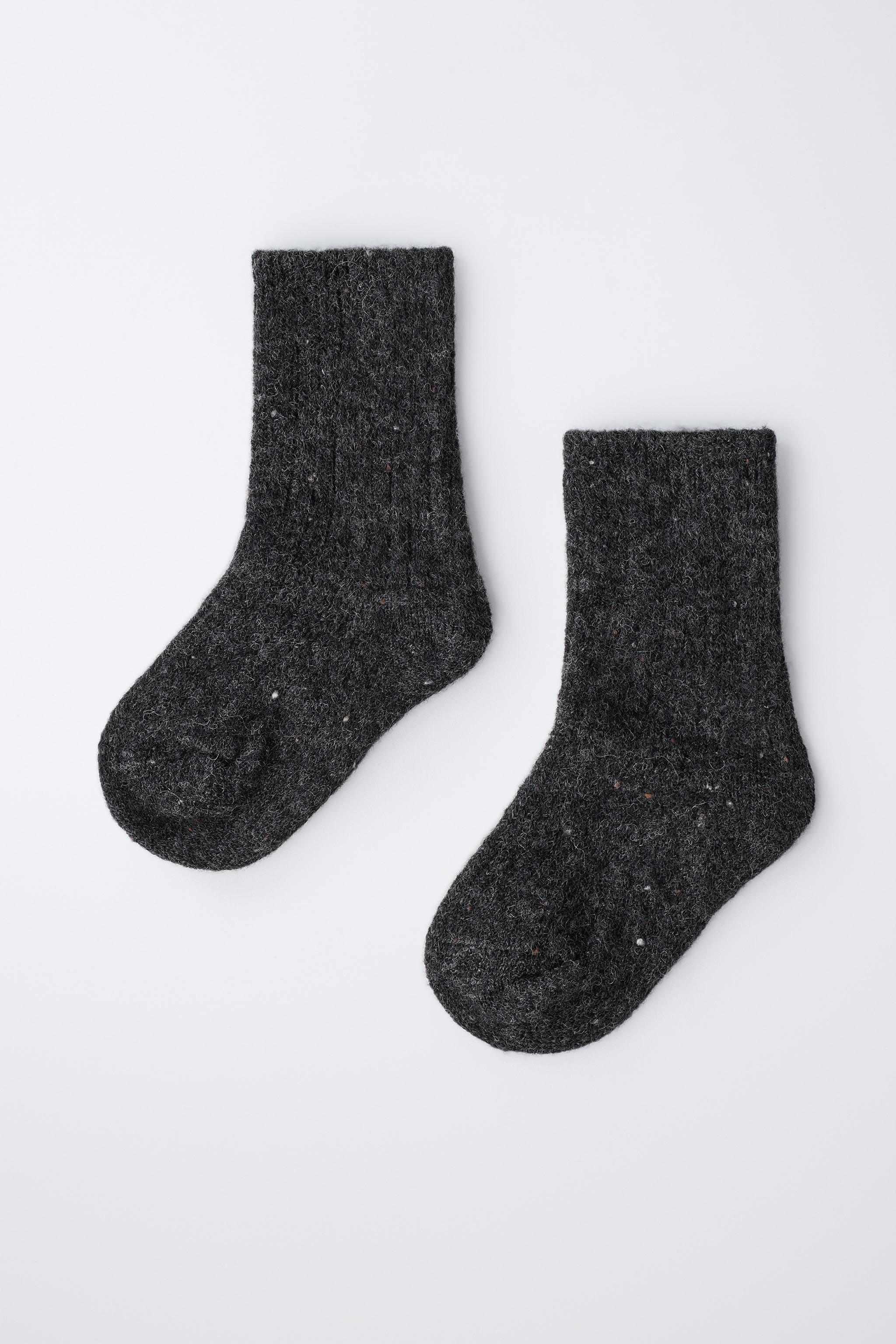 CHAUSSETTES BOUTONNÉES