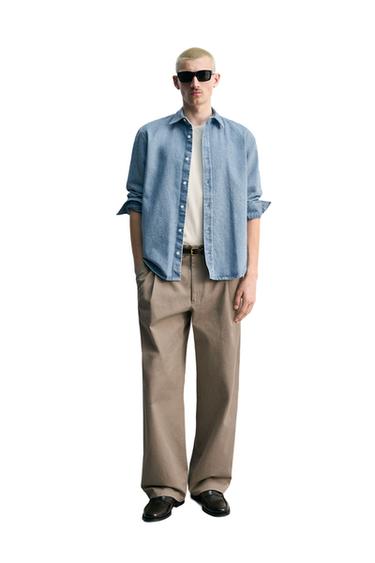 قميص DENIM مغسول بقصة عادية - أزرق باستيل by Zara