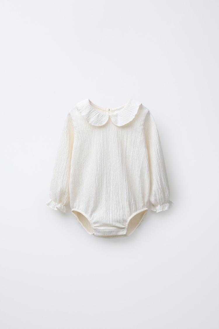 TEXTURED NECK BODYSUIT