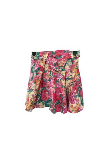 Front view of a skirt with a pink and green floral print.