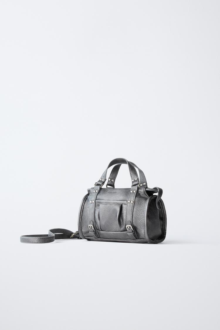 BOLSO CRUZADO CON TACHAS 2