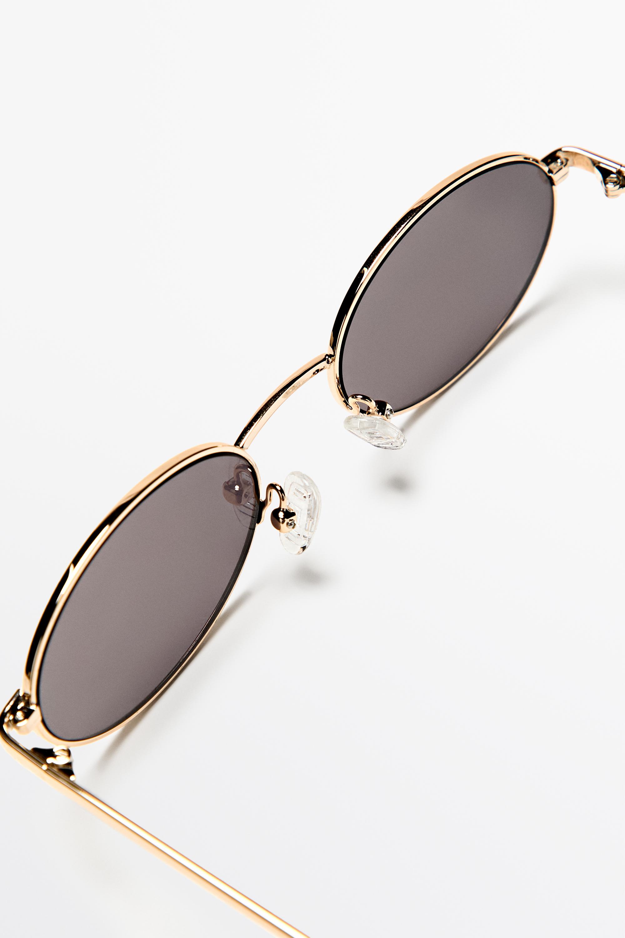 Metallic oval sunglasses
