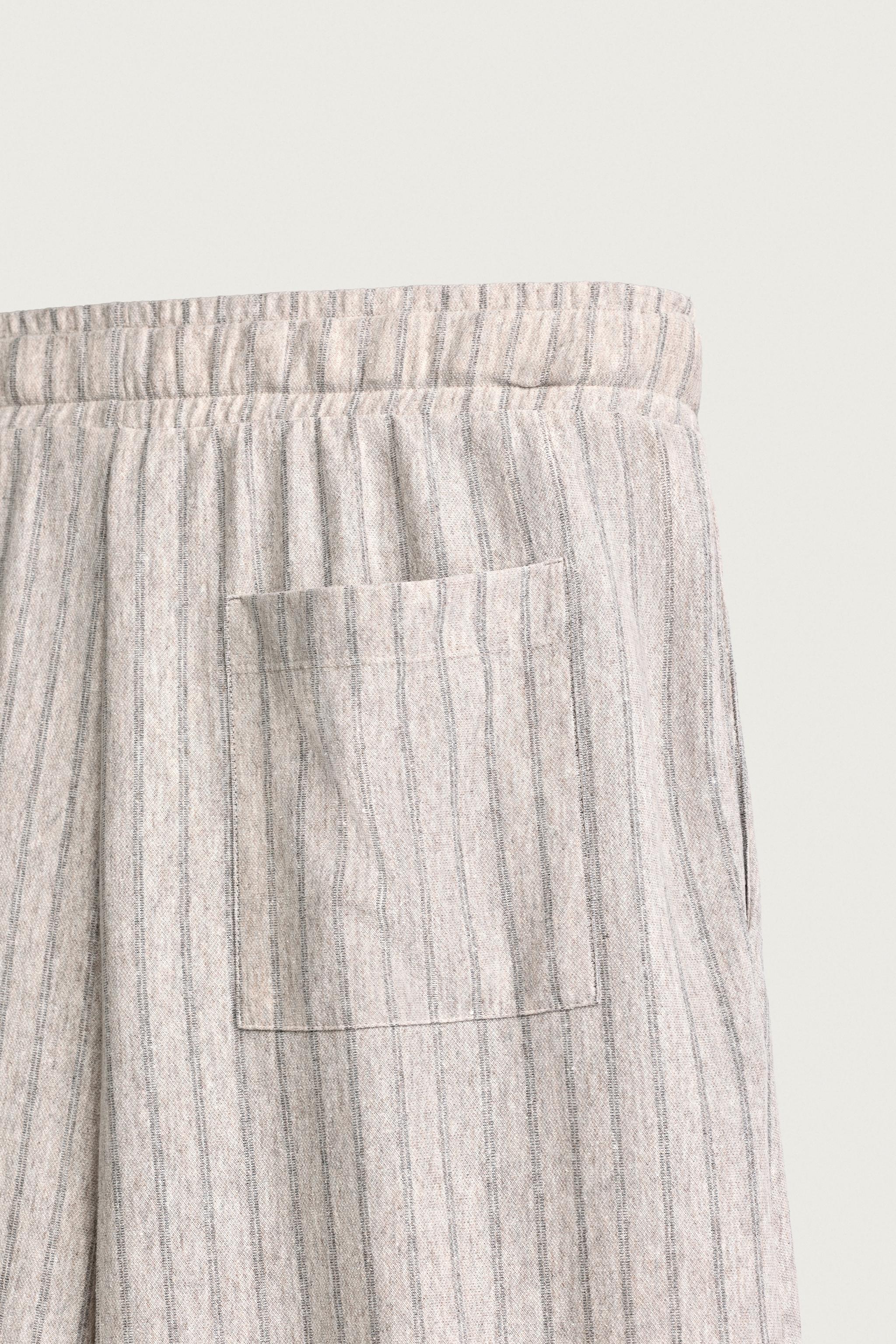STRIPED RELAXED FIT PANTS