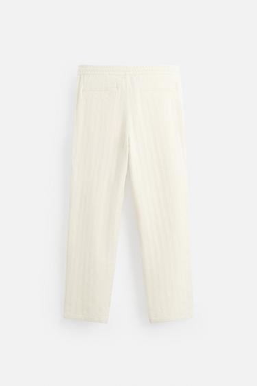 PANTALON EN JACQUARD À RAYURES - Écru de Zara - Image 7