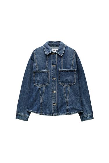 Front view of a blue denim jacket with large front pockets and a centre button fastening.