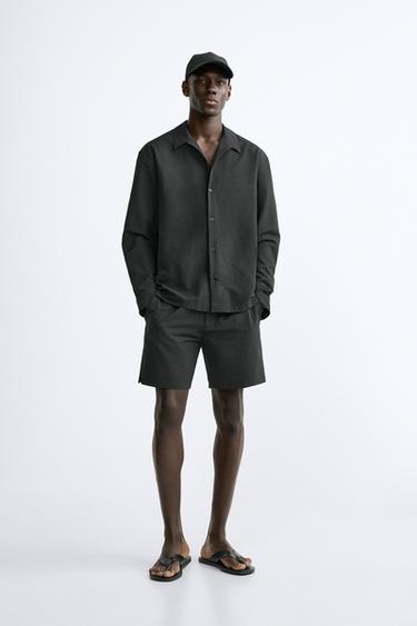 ДЛИННЫЕ ПЛАВКИ ИЗ РЕЛЬЕФНОЙ ТКАНИ — ЧЕРНЫЙ от Zara — изображение 0