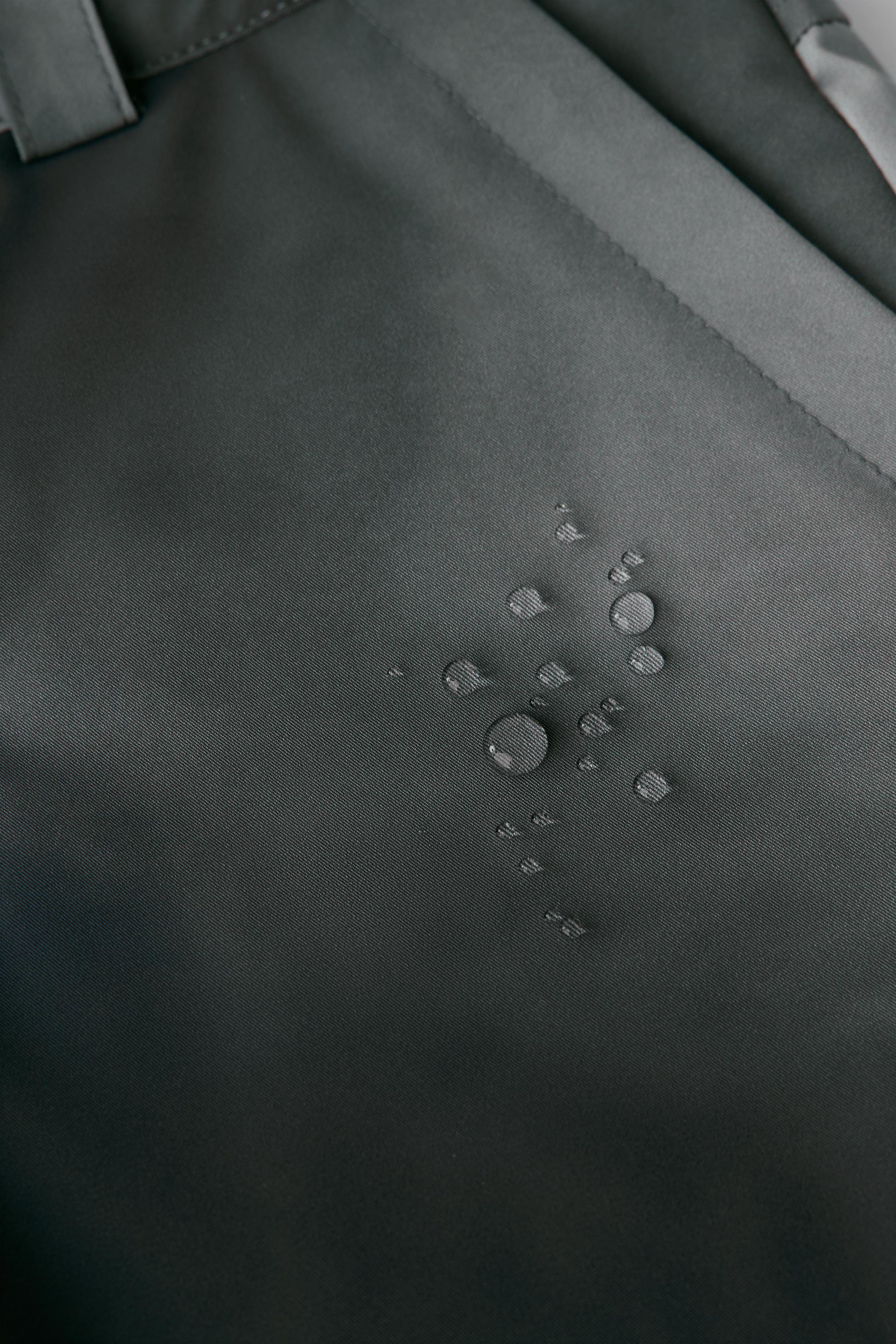 TIE-DYE WATER RESISTANT AND WINDPROOF BIB PANTS RECCO® SYSTEM SKI COLLECTION