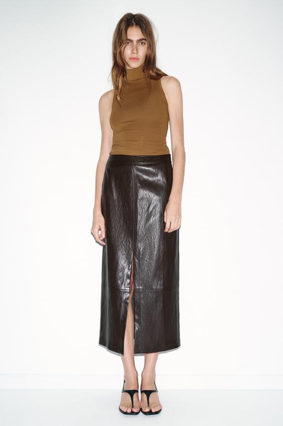 HIGH COLLAR SLEEVELESS TOP