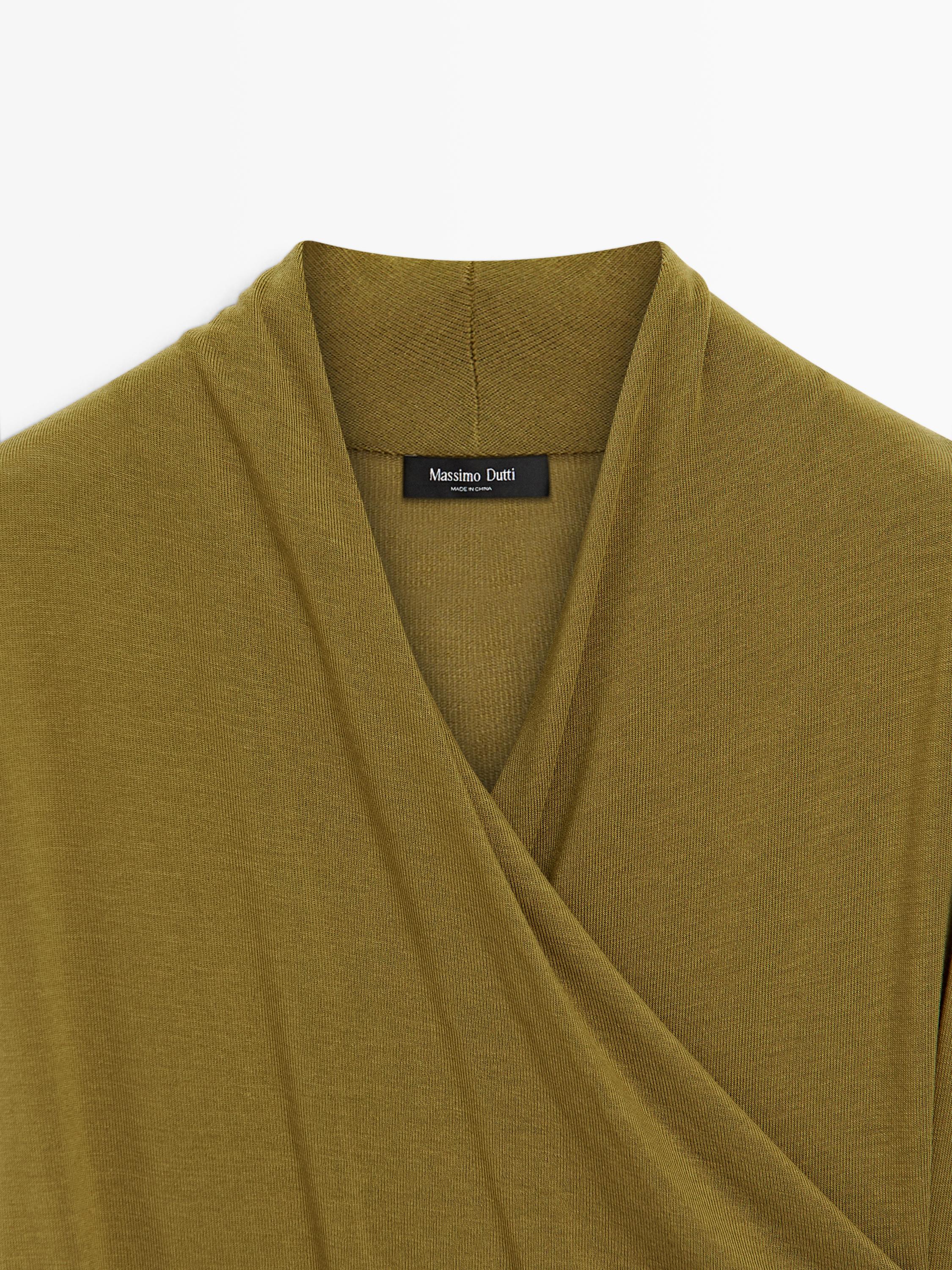 Draped top with surplice neckline
