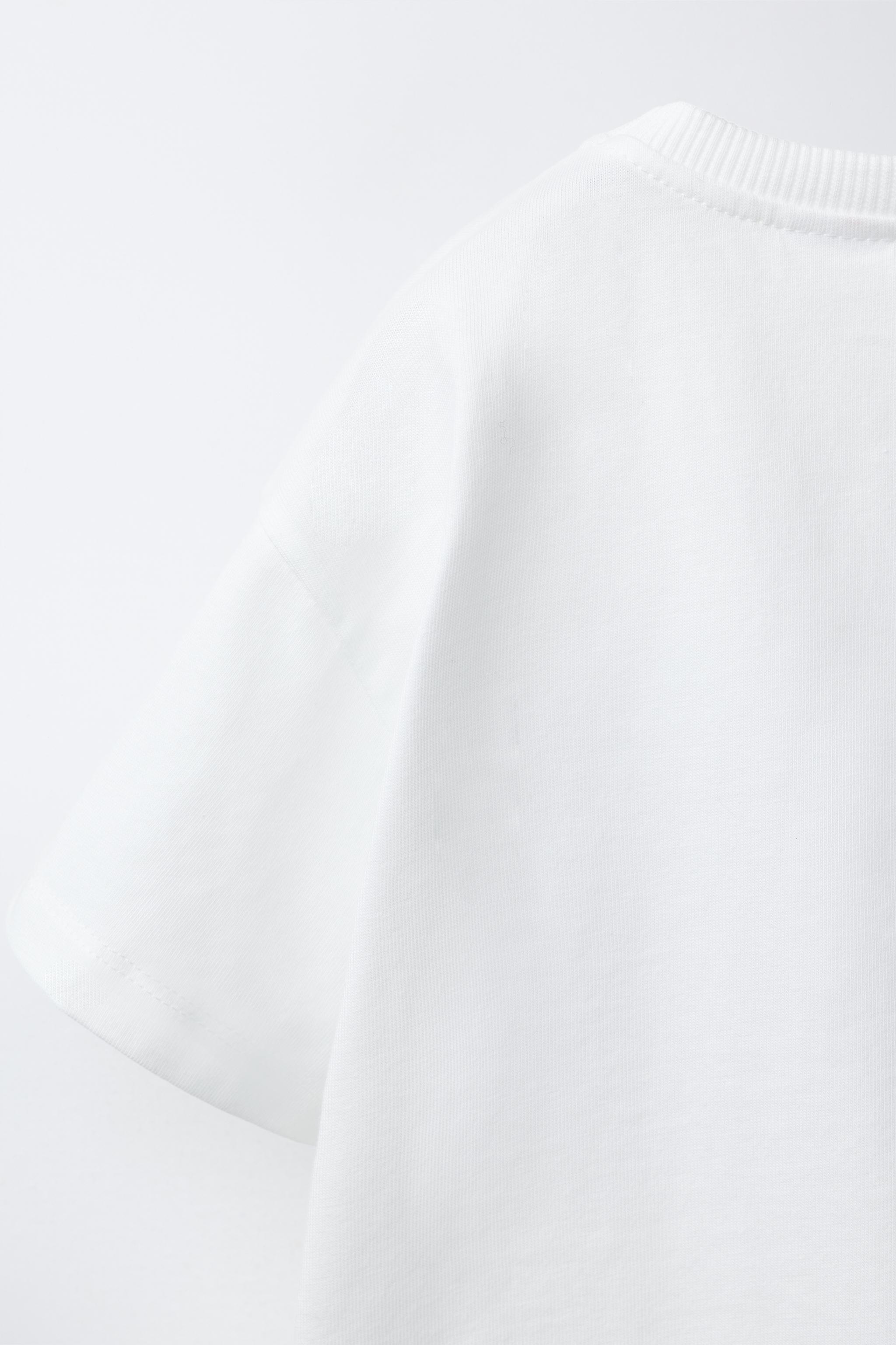 T-SHIRT POCHE ONDULÉE