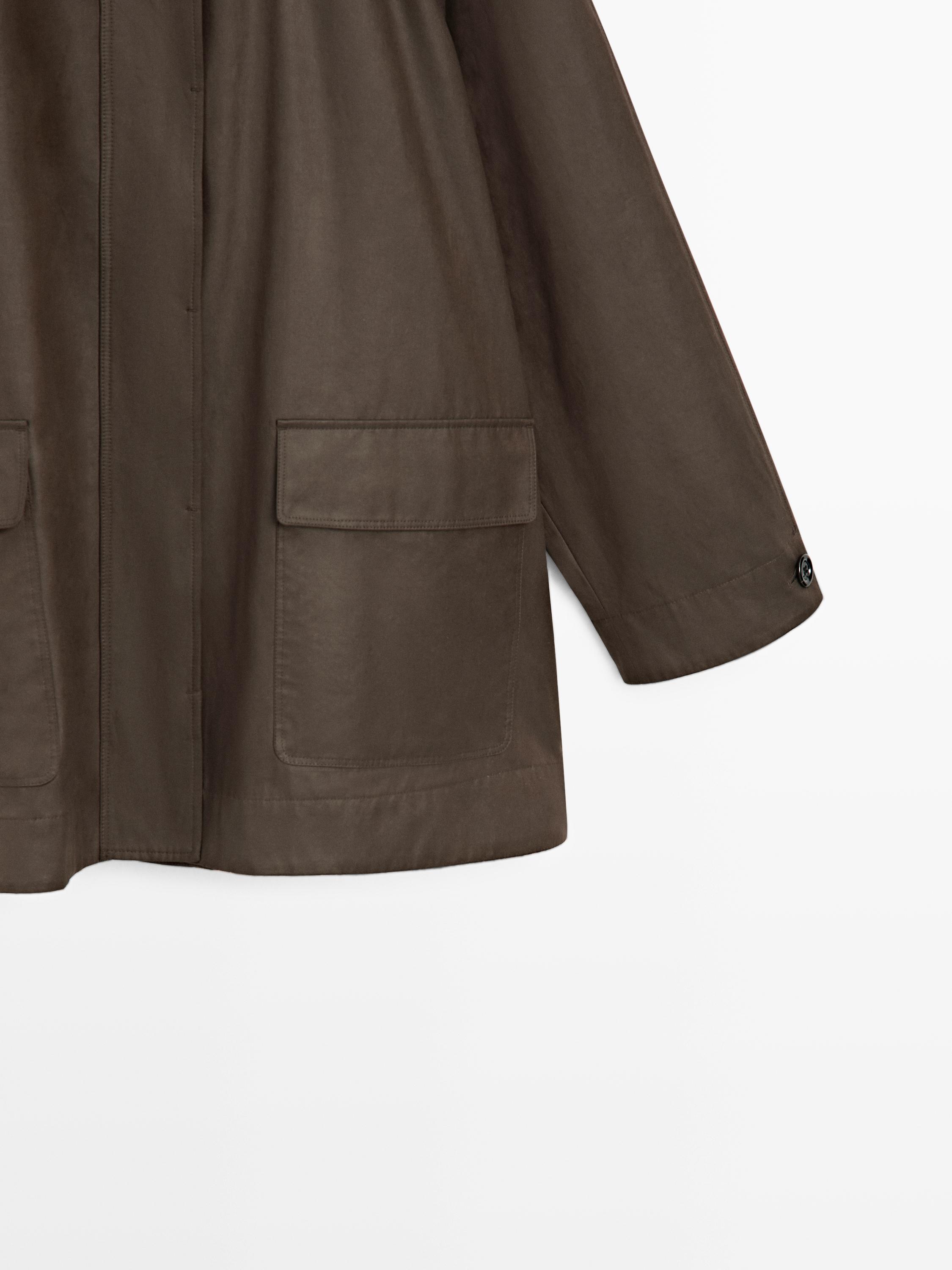 Long parka with pocket details