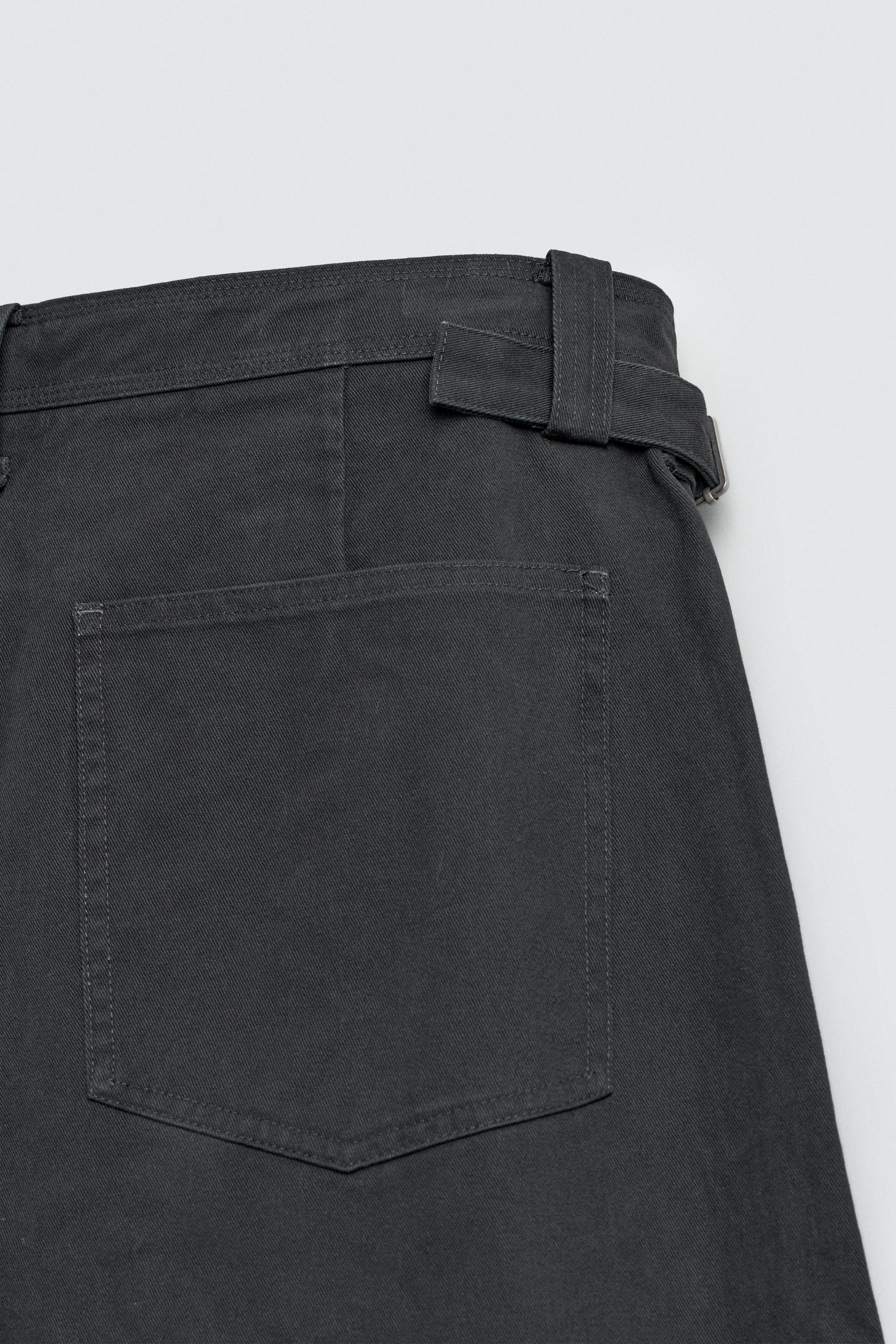 RELAXED FIT PANTS WITH TWISTED SEAM
