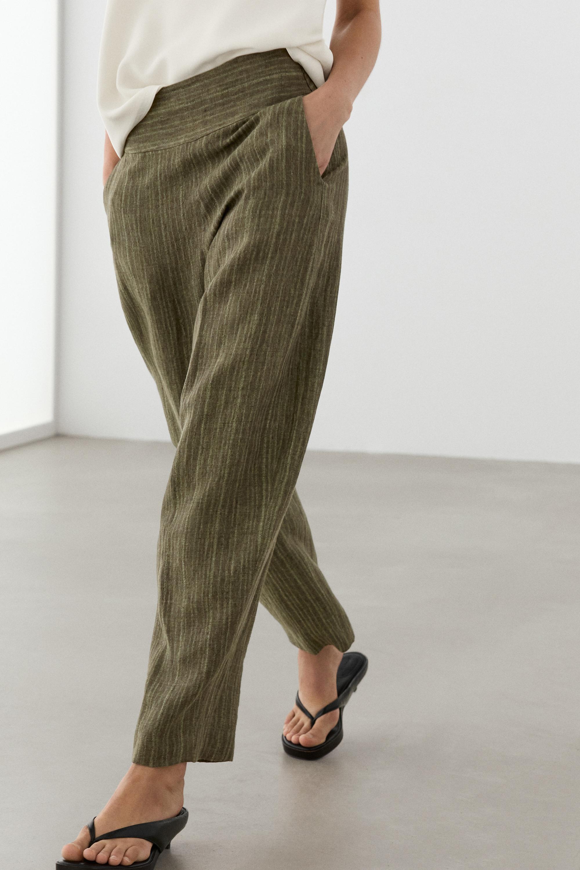Total look linen trousers with corset belt detail