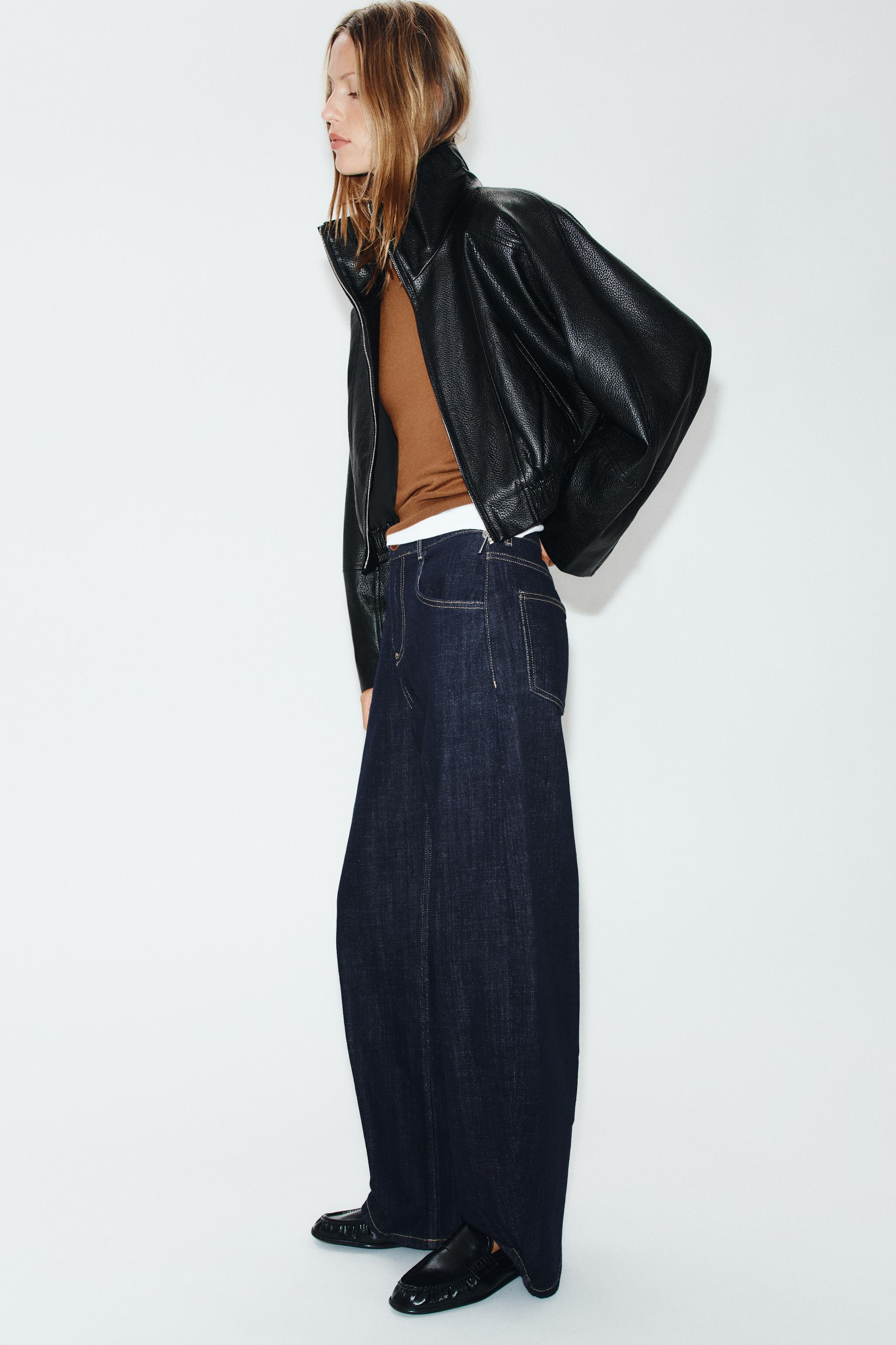 BLOUSON COURT EN MATIÈRE SYNTHÉTIQUE