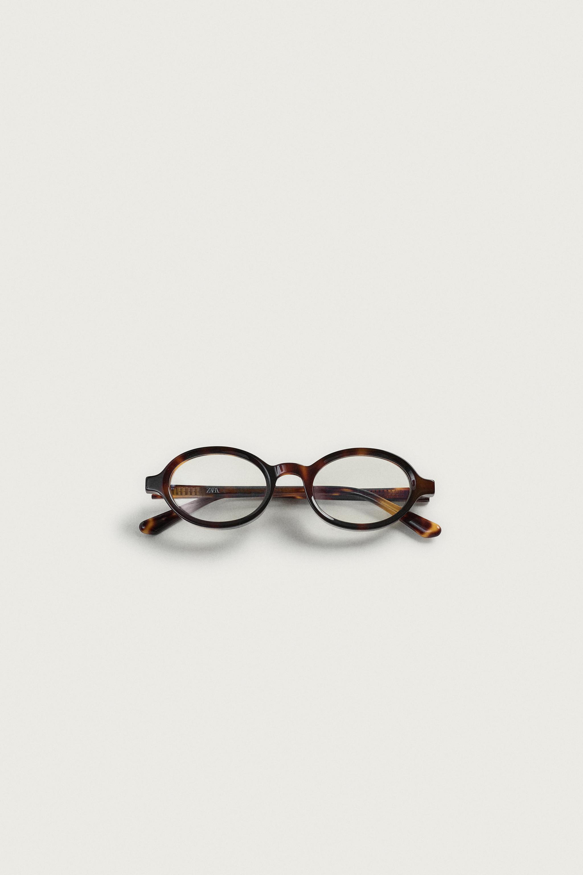 TORTOISESHELL EFFECT OVAL SUNGLASSES