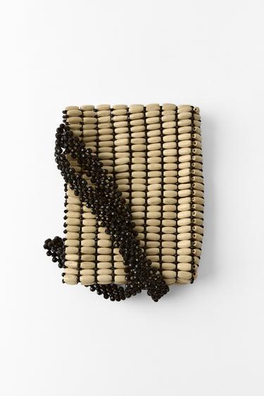 حقيبة يد صغيرة بكرات خشبية - بيج فاتح by Zara