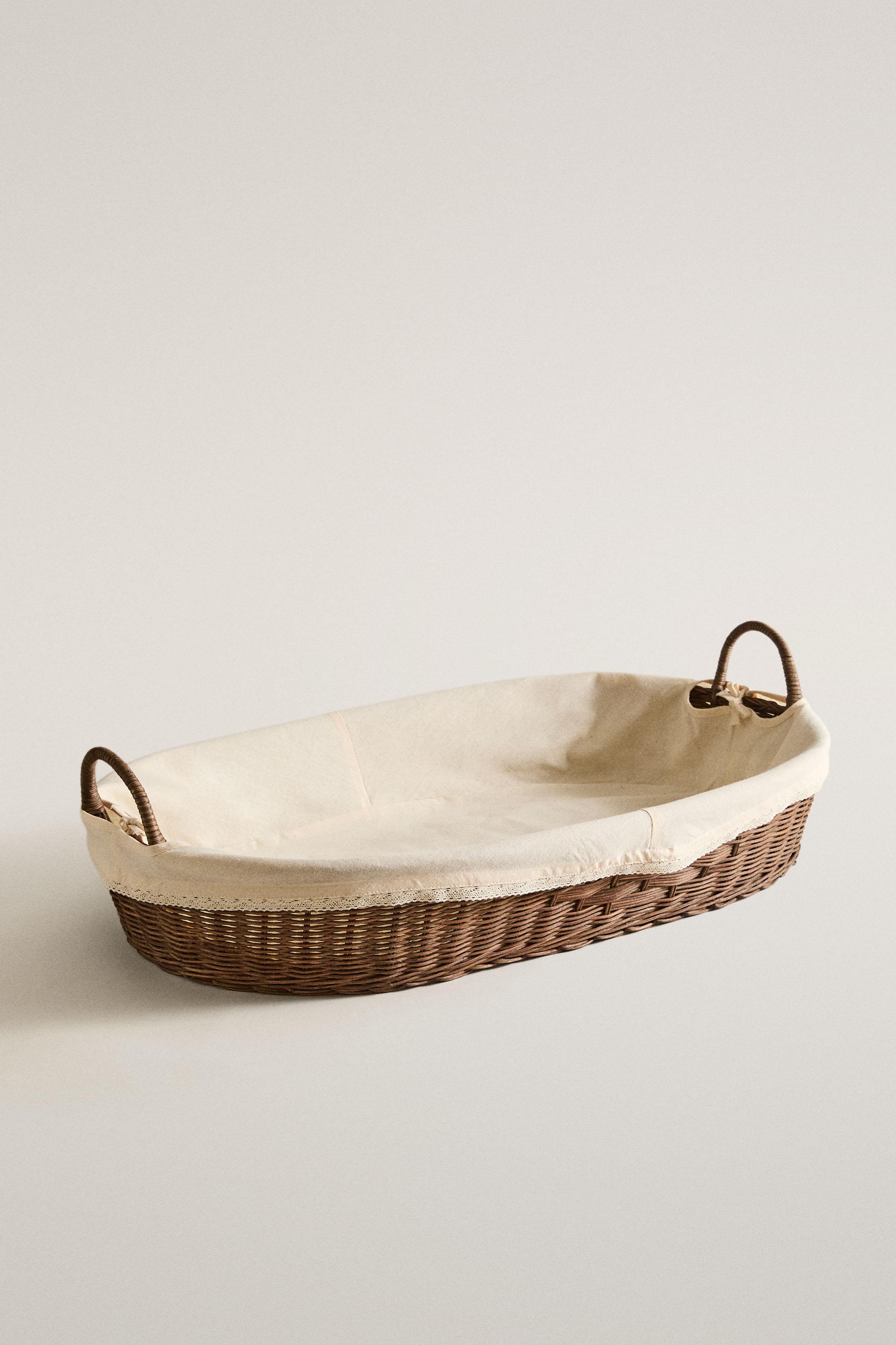 RATTAN CHANGING BASKET