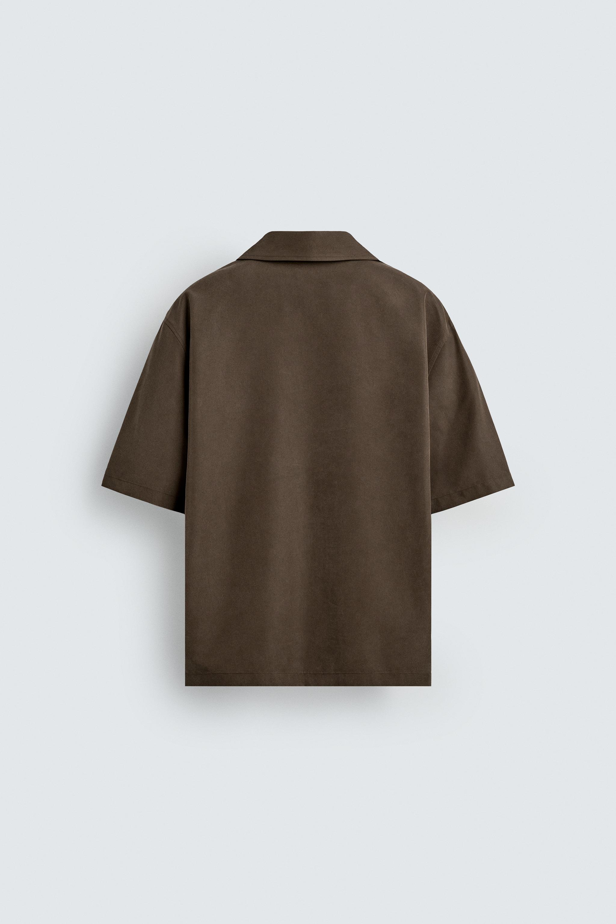 FLOWY POLO SHIRT