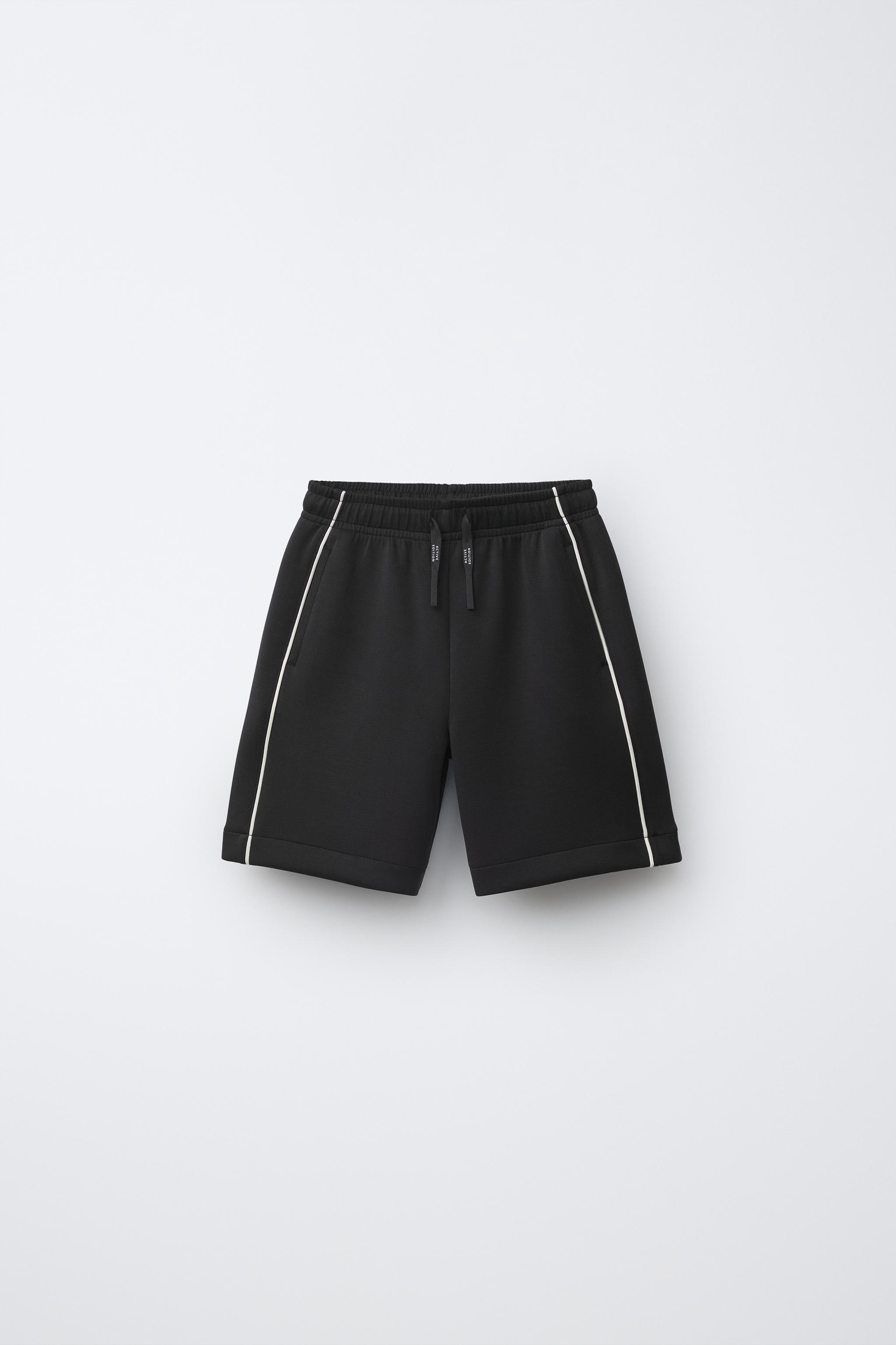 ATHLETIC SHORTS WITH CONTRAST PIPING