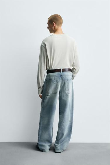 RIPPED BAGGY FIT JEANS - Light blue by Zara