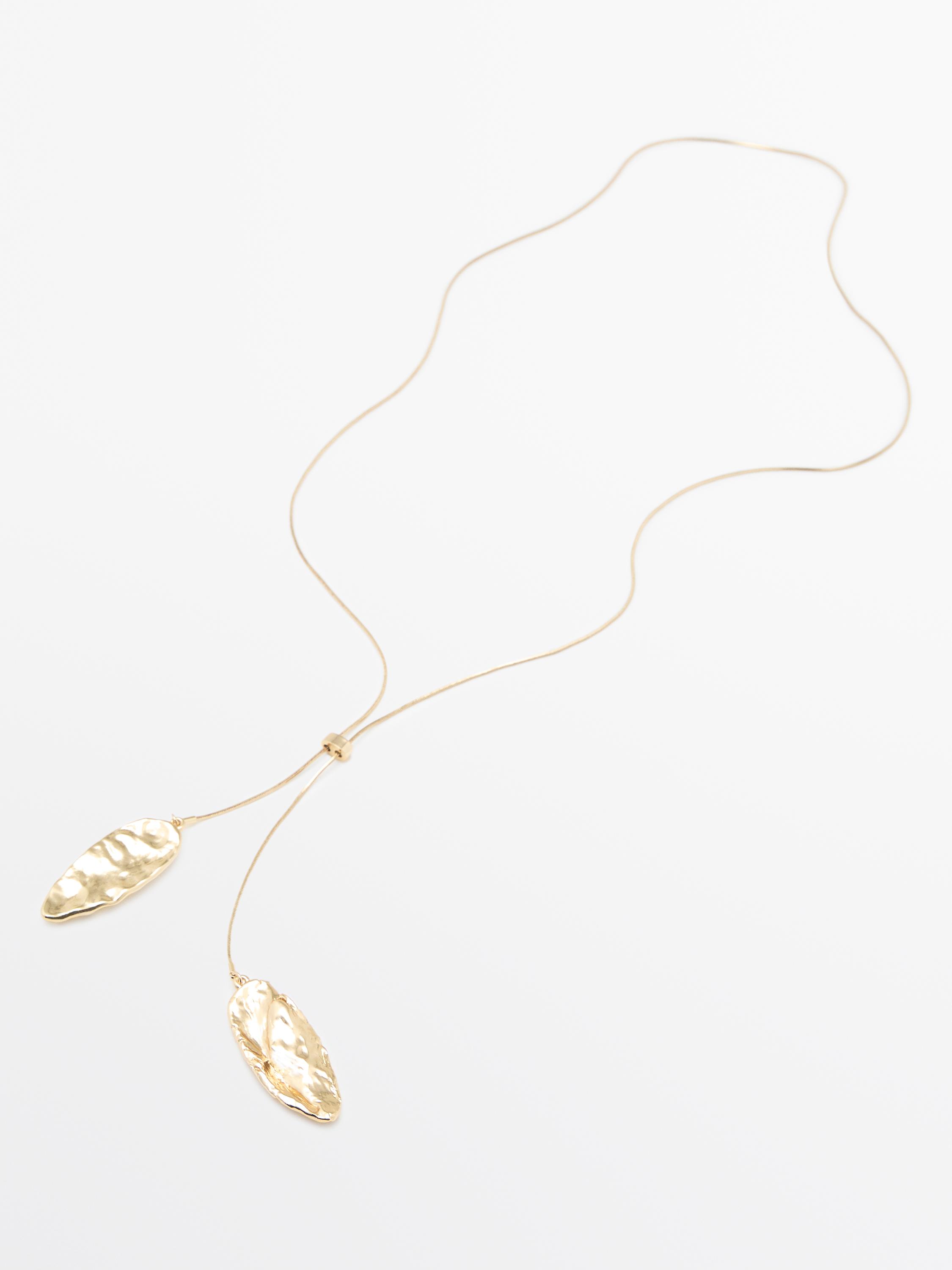 Adjustable necklace with textured pieces