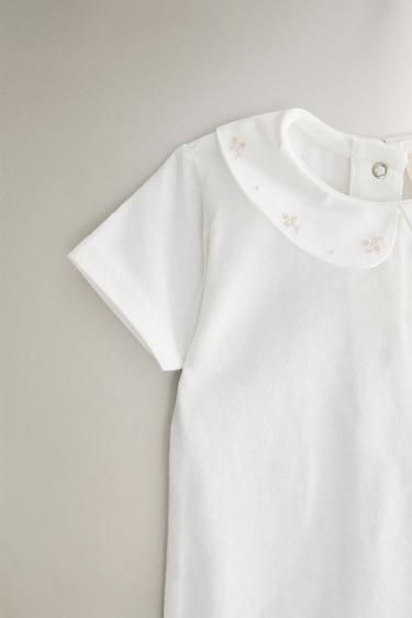 BAVOIR ENFANT BRODERIE FLEURS - Blanc cassé de Zara - Image 2