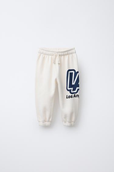 PANTALÓN JOGGER ESTAMPADO VARSITY - Crudo / Marino de Zara - Imagen 0