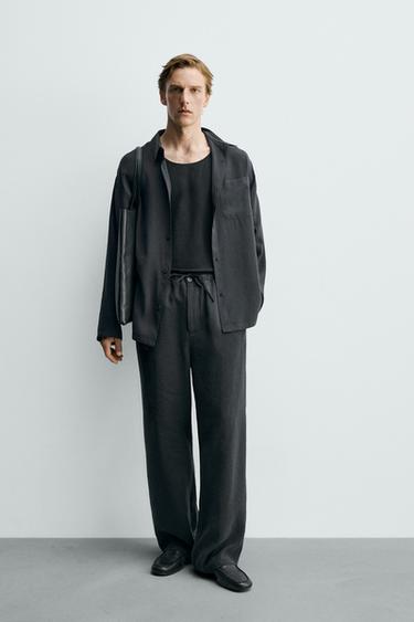 RELAXED FIT FLOWING TROUSERS - Black by Zara