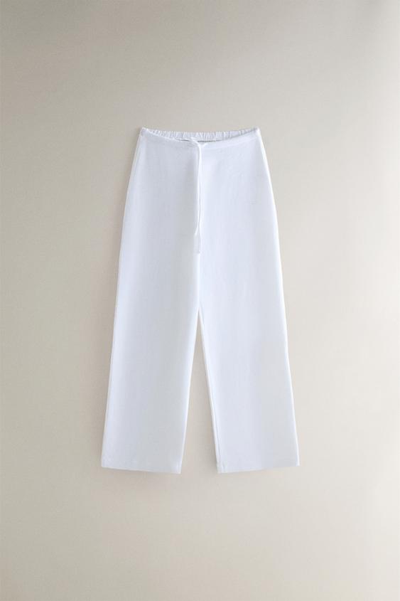 COTTON WIDE-LEG TROUSERS - أبيض الخاص بـ Zara - صورة 0