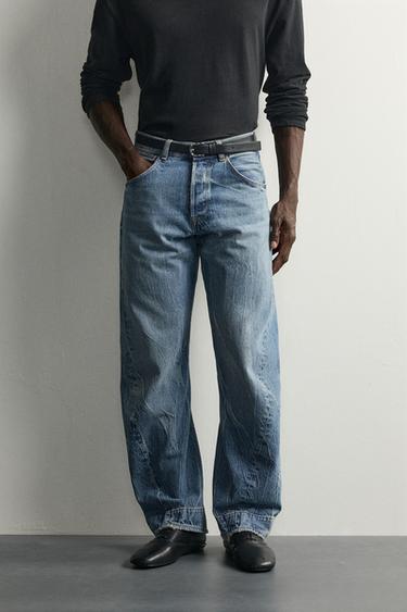 STRAIGHT-FIT JEANS WITH TWISTED SEAMS — Mid-blue 2